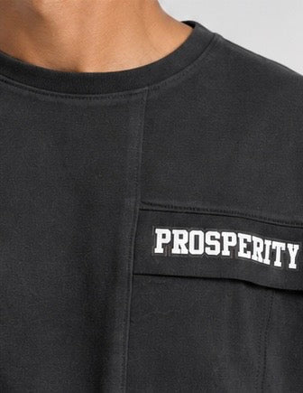 Prosperity Pocket Black tee
